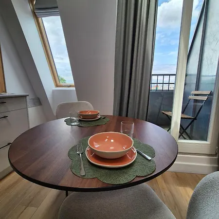 Between The Roofs Of Jezyce Daire