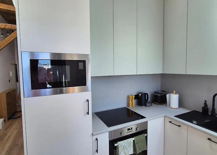 Between The Roofs Of Jezyce Daire Poznan